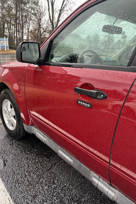 Red SUV with clean paint after repair